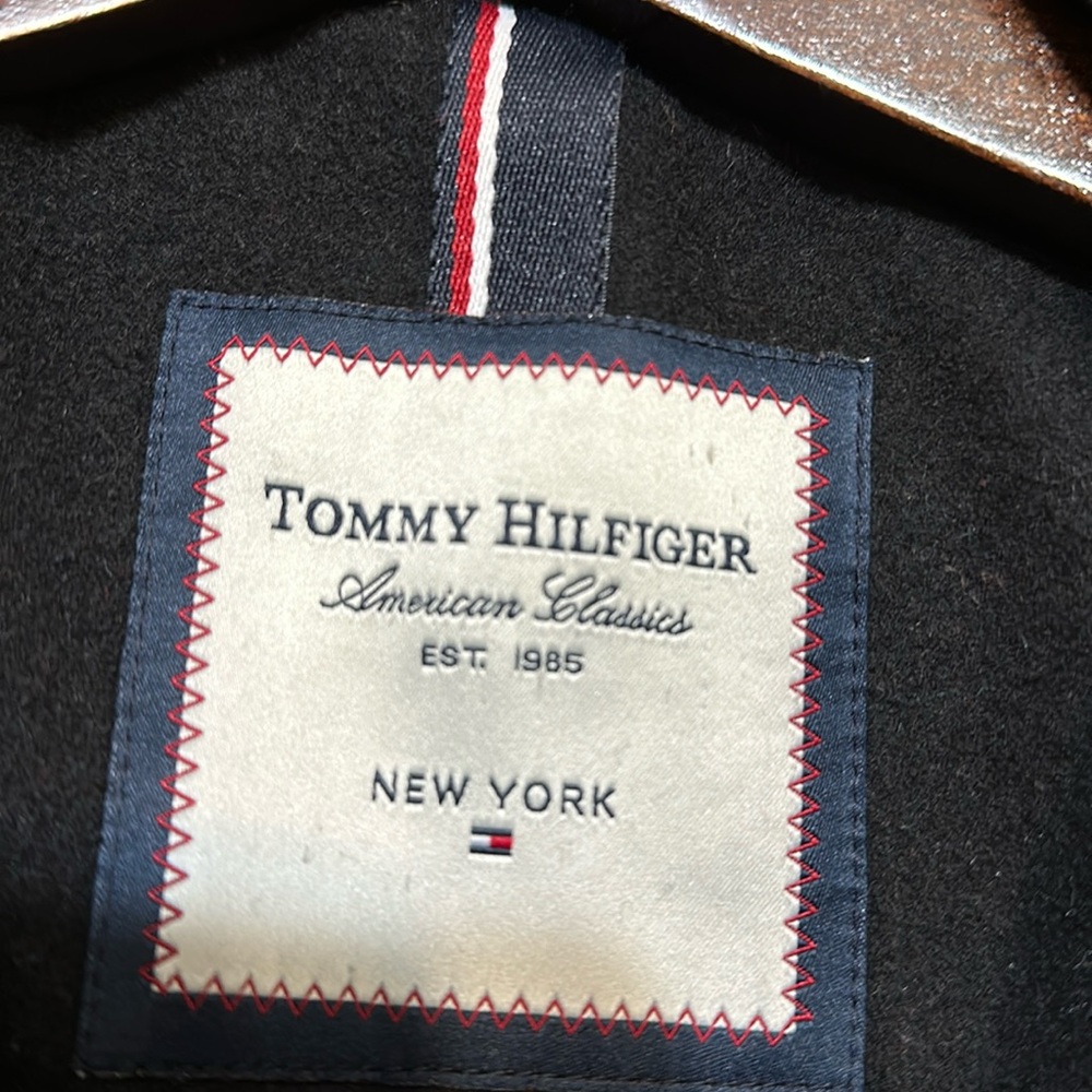 Black, wool shell 62, polyester 34 other fiber